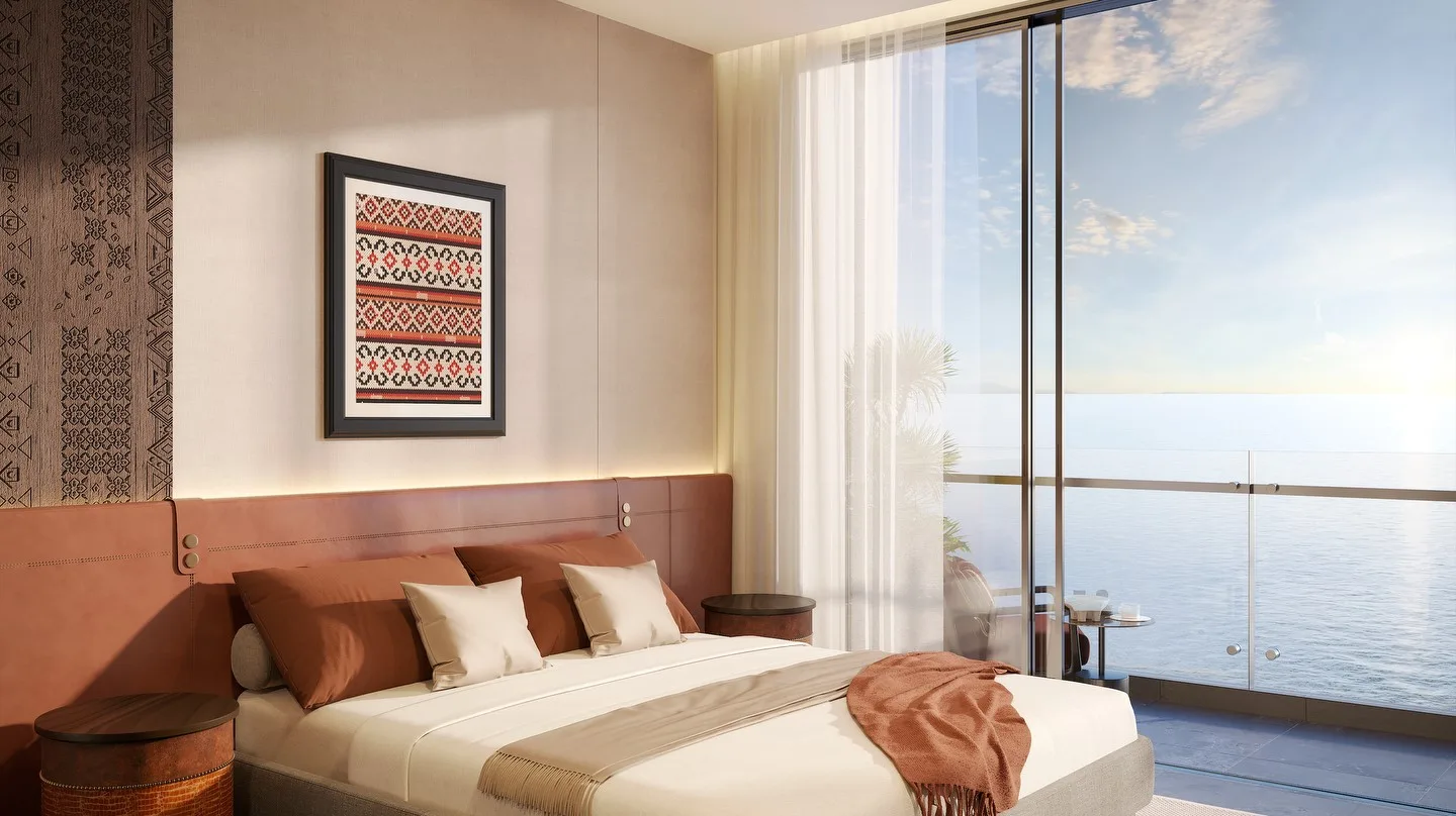 Nội thất phòng ngủ căn hộ Q’Terra Quy Nhơn với tông màu terracotta và hoa văn bản địa